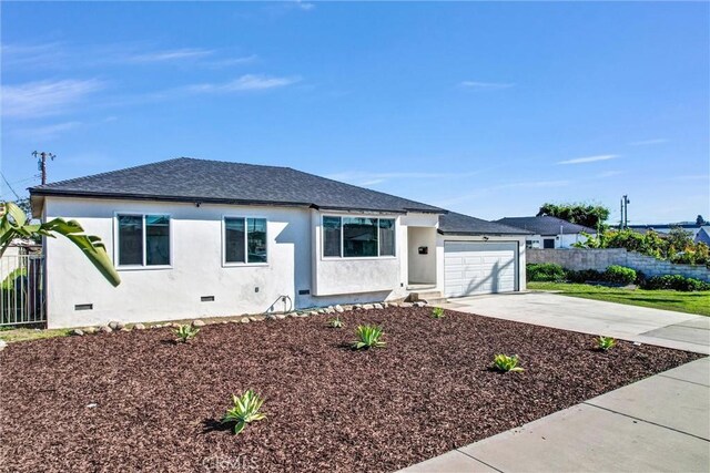 ranch-style home featuring fence, stucco siding, concrete driveway, a garage, and crawl space