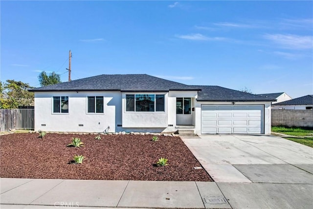 single story home featuring crawl space, stucco siding, driveway, and fence