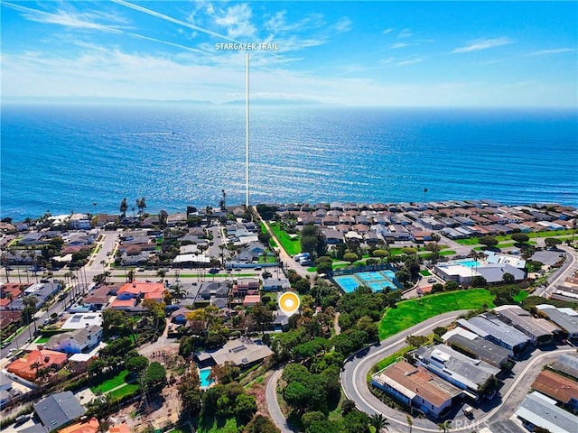 bird's eye view with a residential view and a water view