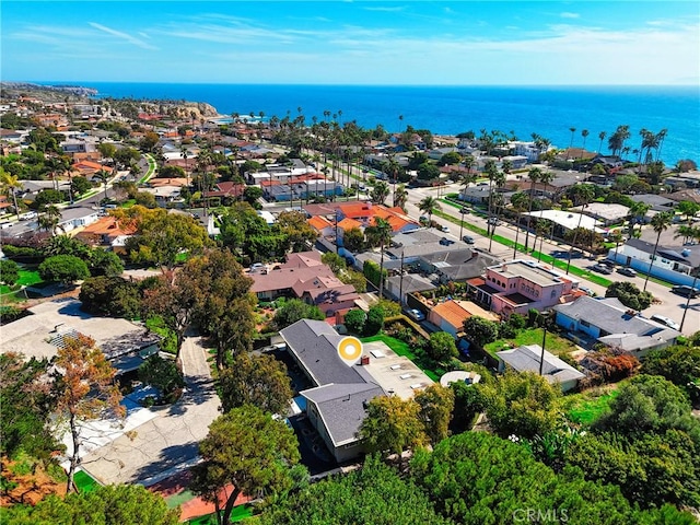 birds eye view of property featuring a water view and a residential view