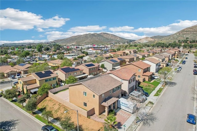 drone / aerial view featuring a mountain view and a residential view