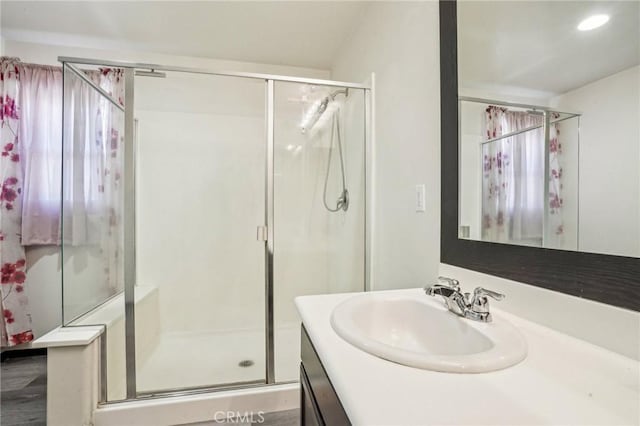 full bath with recessed lighting, a stall shower, and vanity