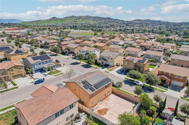 aerial view featuring a mountain view and a residential view