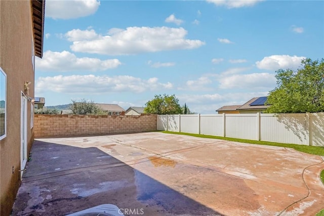 view of patio with a fenced backyard