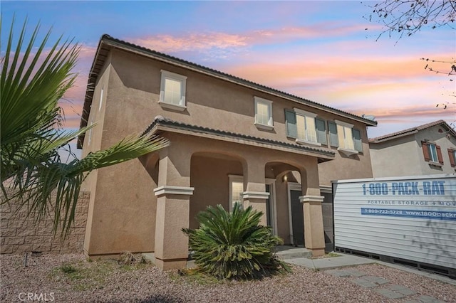 view of front of house with stucco siding