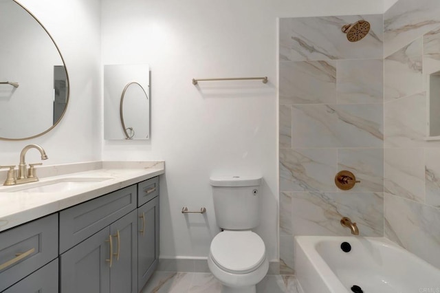 bathroom featuring baseboards, toilet, shower / bath combination, marble finish floor, and vanity