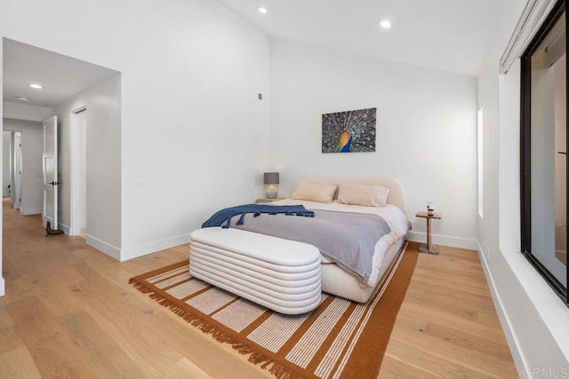 bedroom featuring recessed lighting, baseboards, and light wood-style floors