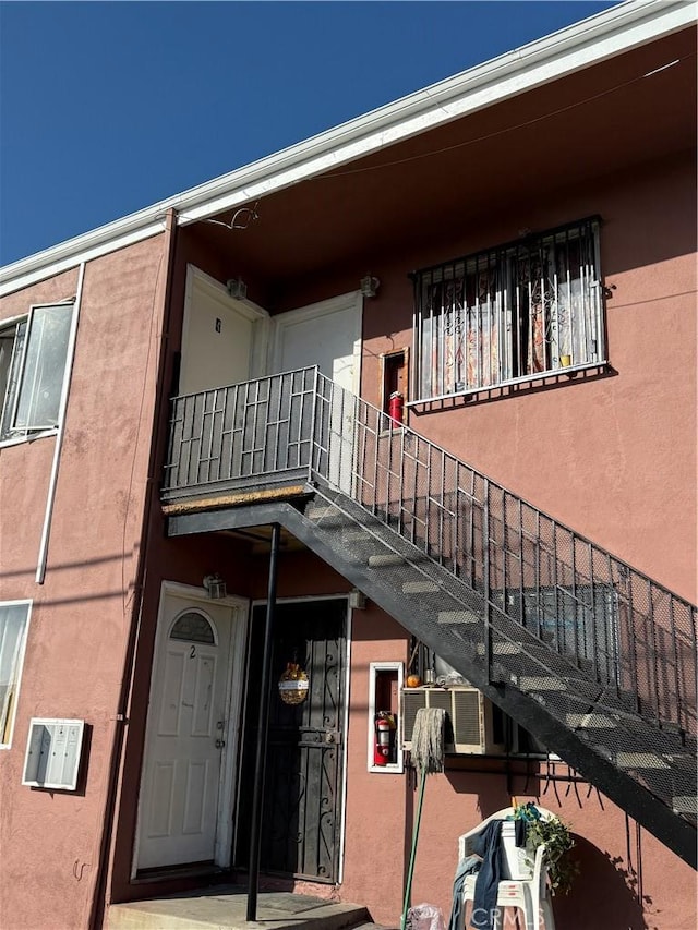 view of building exterior with stairway