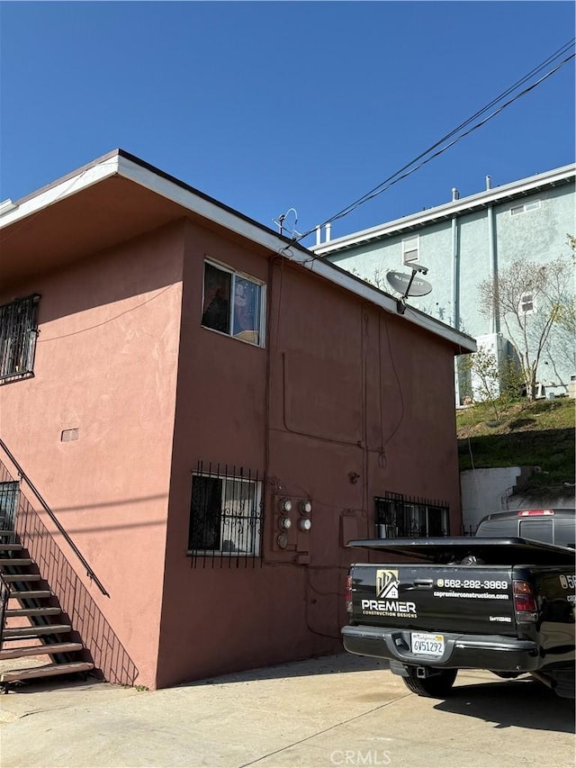 view of building exterior featuring stairs