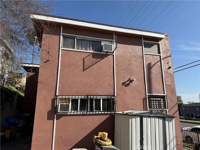 exterior space with stucco siding