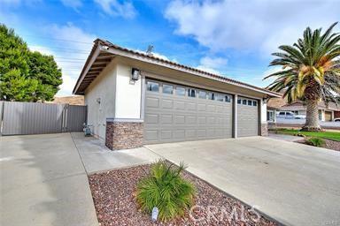 garage with fence