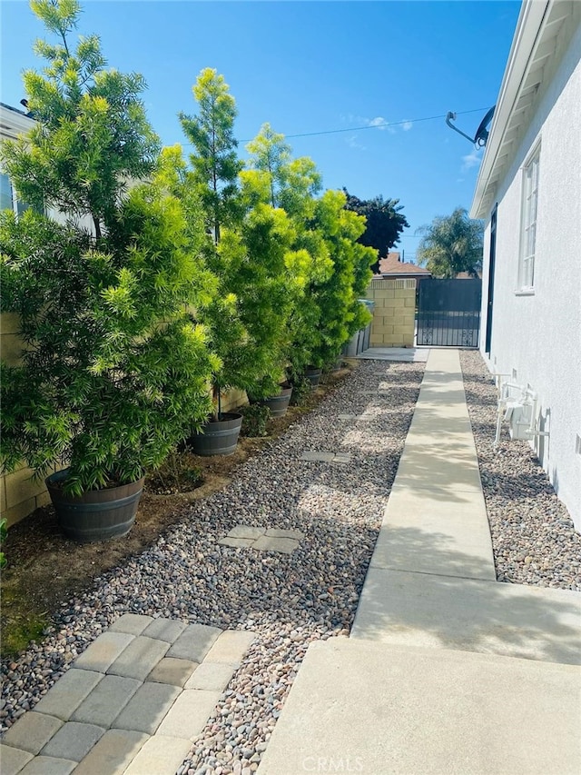 view of yard featuring a gate and fence