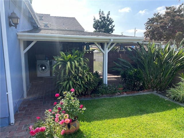 9357 Parrot Ave, Downey, CA 90240 - view of yard with washer / dryer and fence