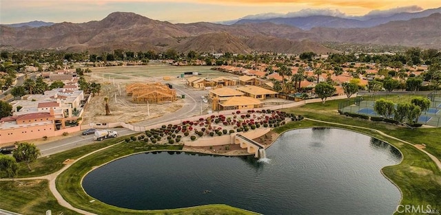 bird's eye view featuring a water and mountain view