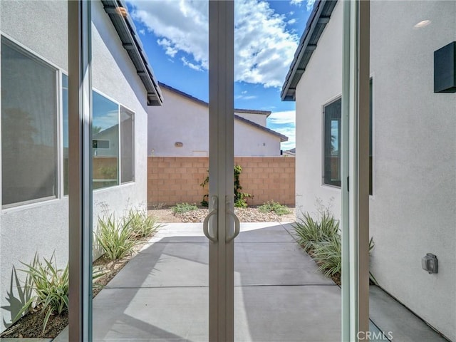 view of patio / terrace featuring fence