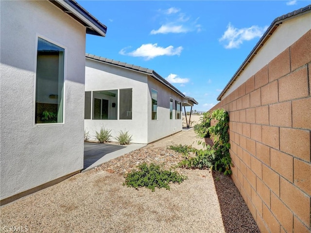 view of yard featuring a patio area and fence