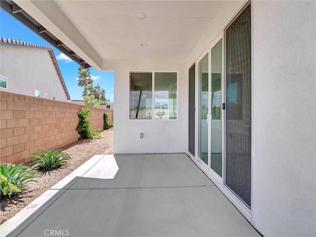 view of patio with fence