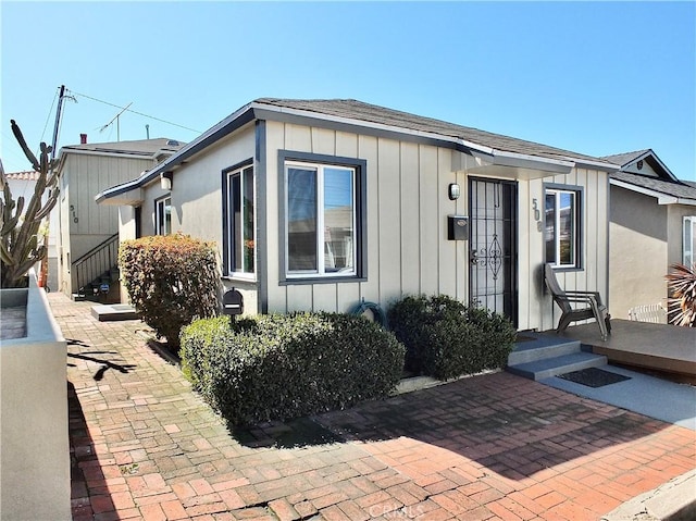 508 30th St, Hermosa Beach, CA 90254 - view of front of home with board and batten siding and a shingled roof