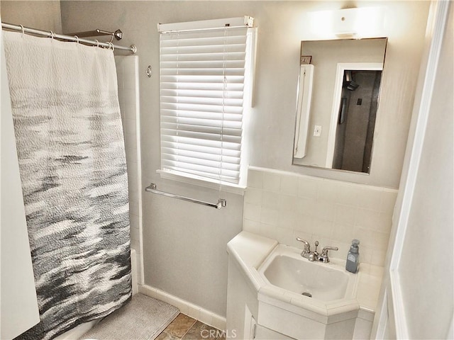 508 30th St, Hermosa Beach, CA 90254 - full bathroom featuring vanity, a shower with curtain, tile walls, tile patterned flooring, and decorative backsplash