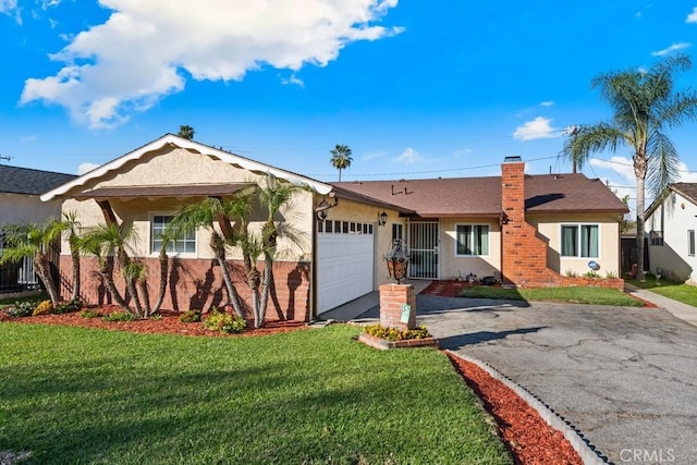 ranch-style home with stucco siding, a chimney, a front lawn, a garage, and aphalt driveway