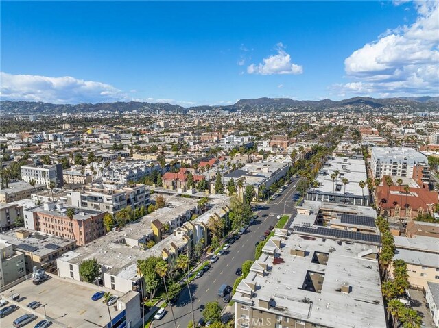 bird's eye view featuring a mountain view and a view of city