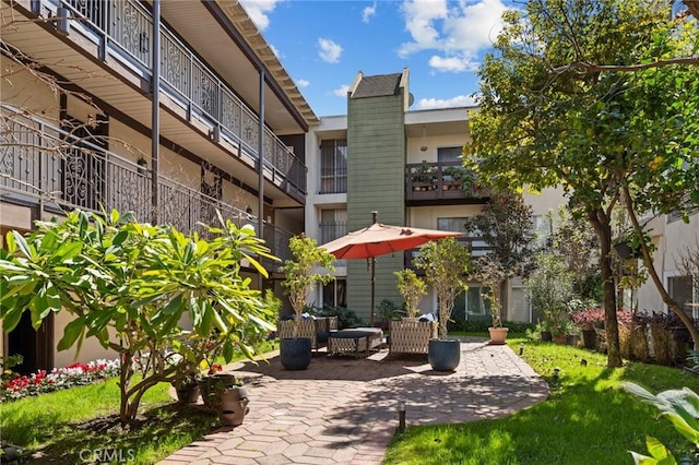 view of community featuring a patio area