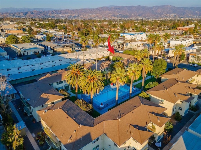 birds eye view of property with a residential view and a mountain view