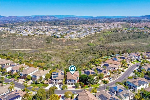 aerial view with a residential view and a mountain view