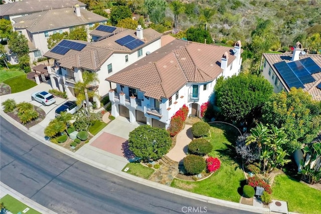 birds eye view of property with a residential view