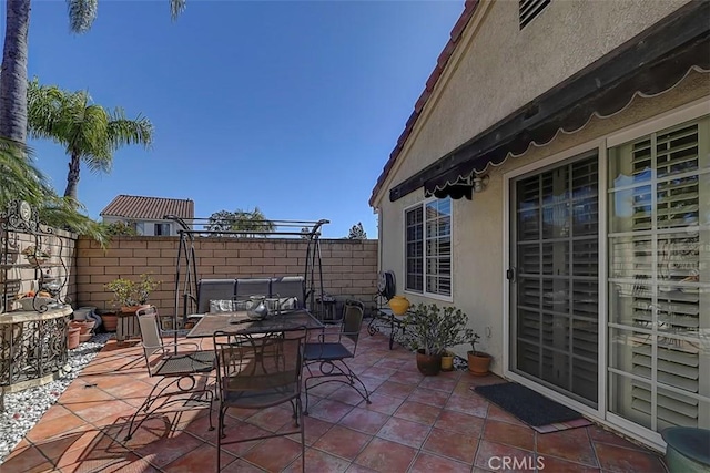 view of patio with fence