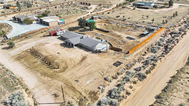 drone / aerial view with a rural view and view of desert