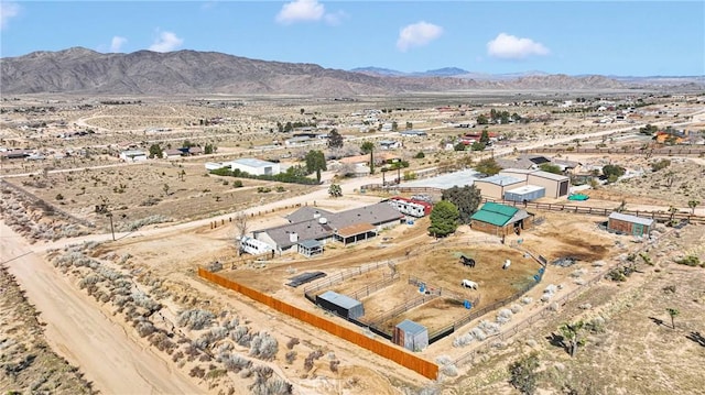 bird's eye view with view of desert, a rural view, and a mountain view