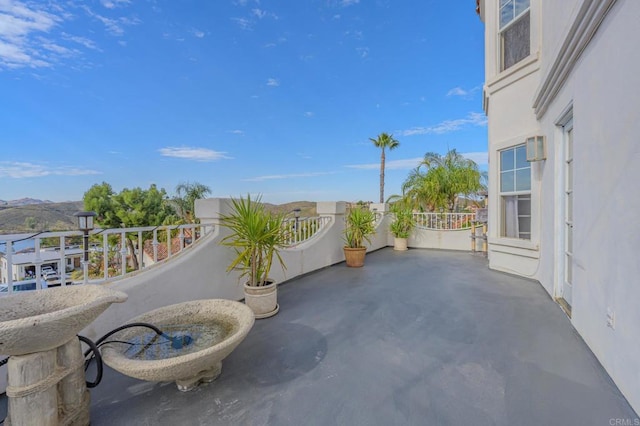 22633 Inspiration Pt, Canyon Lake, CA 92587 - view of patio / terrace with a balcony
