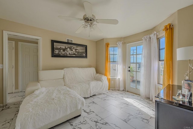 22633 Inspiration Pt, Canyon Lake, CA 92587 - sitting room featuring visible vents, marble finish floor, and ceiling fan