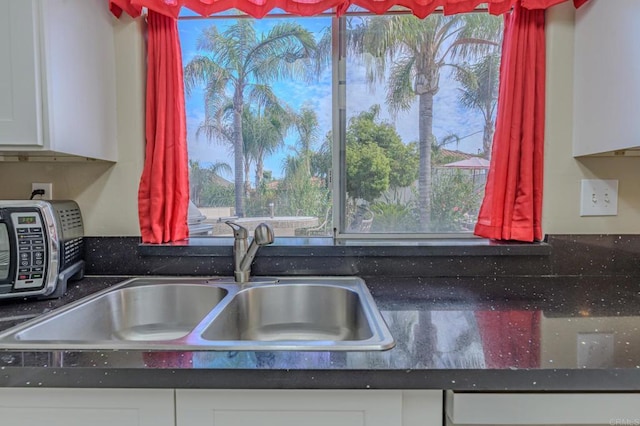 22633 Inspiration Pt, Canyon Lake, CA 92587 - kitchen featuring a wealth of natural light, white cabinetry, and a sink