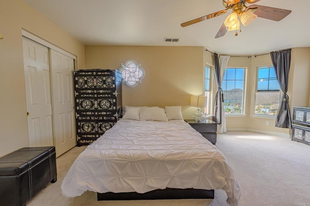 22633 Inspiration Pt, Canyon Lake, CA 92587 - bedroom featuring carpet, visible vents, baseboards, ceiling fan, and a closet