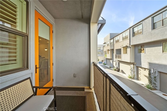 balcony featuring a residential view