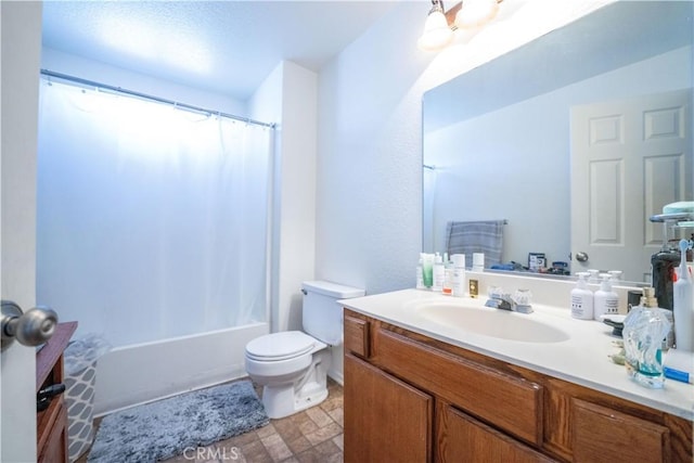 full bathroom with shower / bathtub combination with curtain, toilet, and vanity