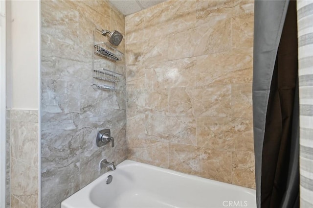 bathroom featuring shower / tub combo with curtain