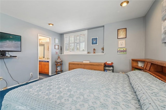 bedroom featuring connected bathroom