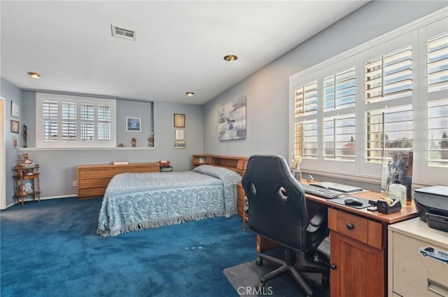 bedroom with carpet flooring, baseboards, and visible vents