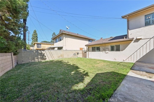 view of yard featuring a fenced backyard