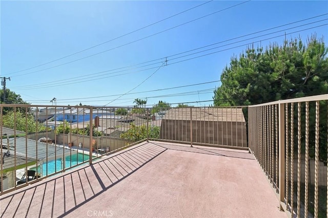 view of patio with a fenced in pool and fence