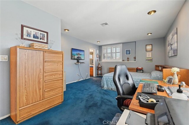 home office featuring visible vents and carpet floors