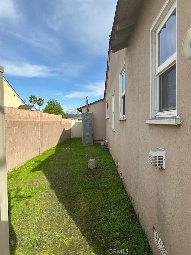 view of yard featuring a fenced backyard