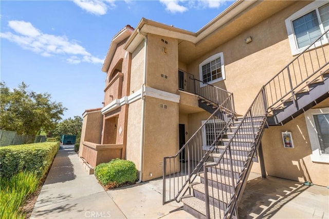 view of property with stairway