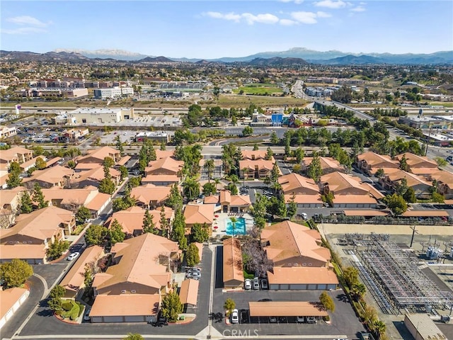 aerial view with a mountain view and a residential view