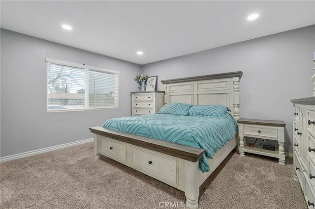 bedroom featuring recessed lighting, baseboards, and light carpet