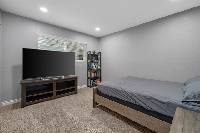 carpeted bedroom with recessed lighting and baseboards