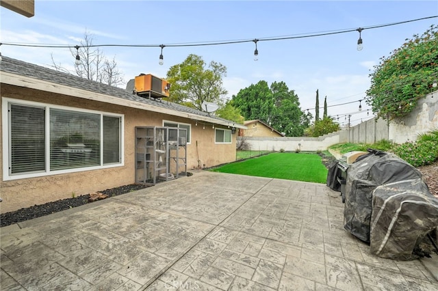 view of patio / terrace featuring area for grilling and fence